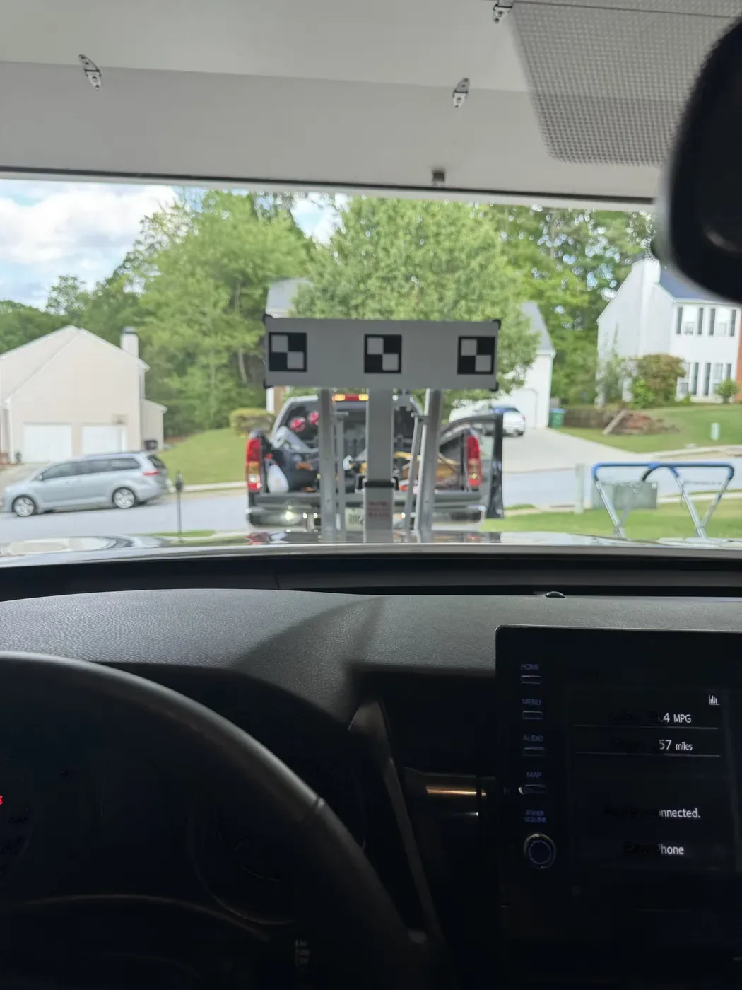 ADAS calibration target viewed through a vehicle windshield