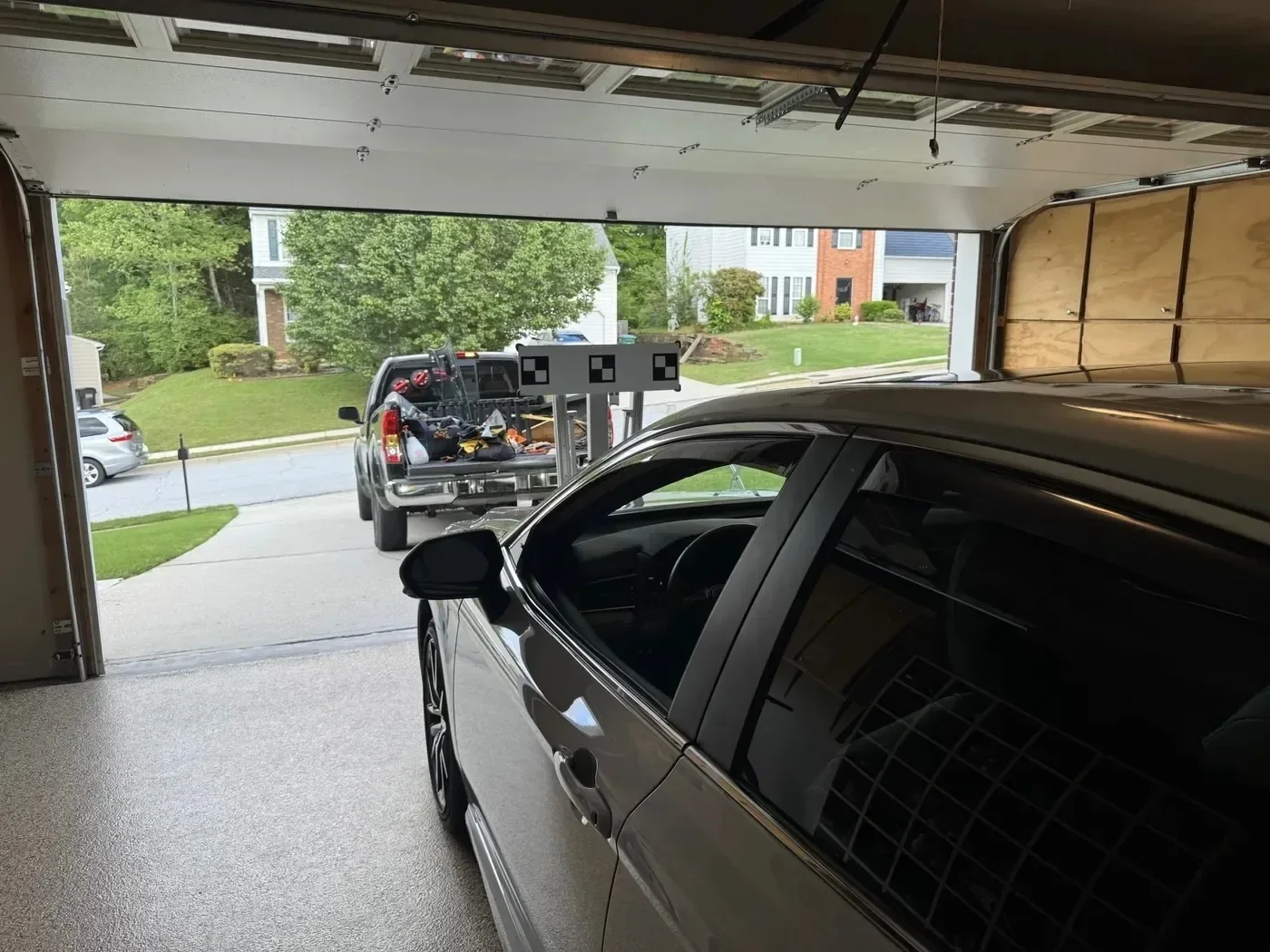 Mobile ADAS calibration setup at a residential garage
